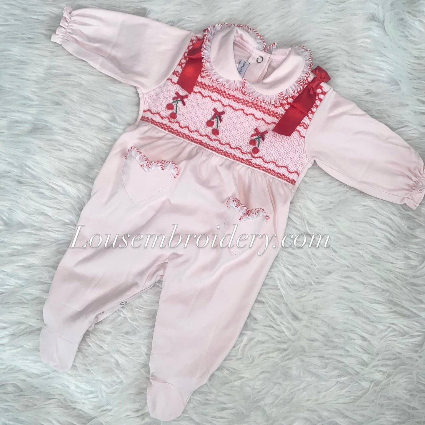 Cherry and bows luxury Pima cotton smocked babygrow small sizing