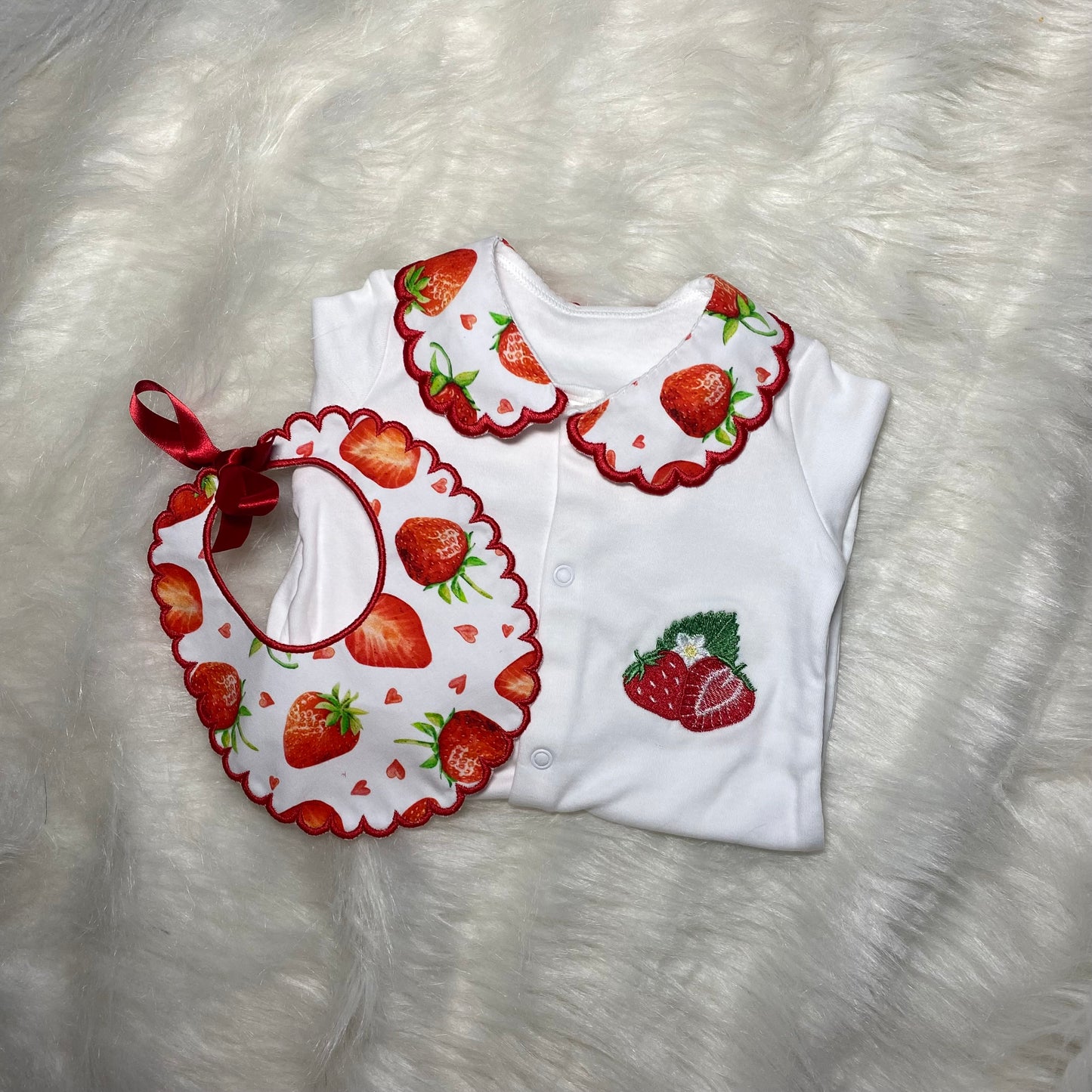 0-3m strawberry babygrow and bib