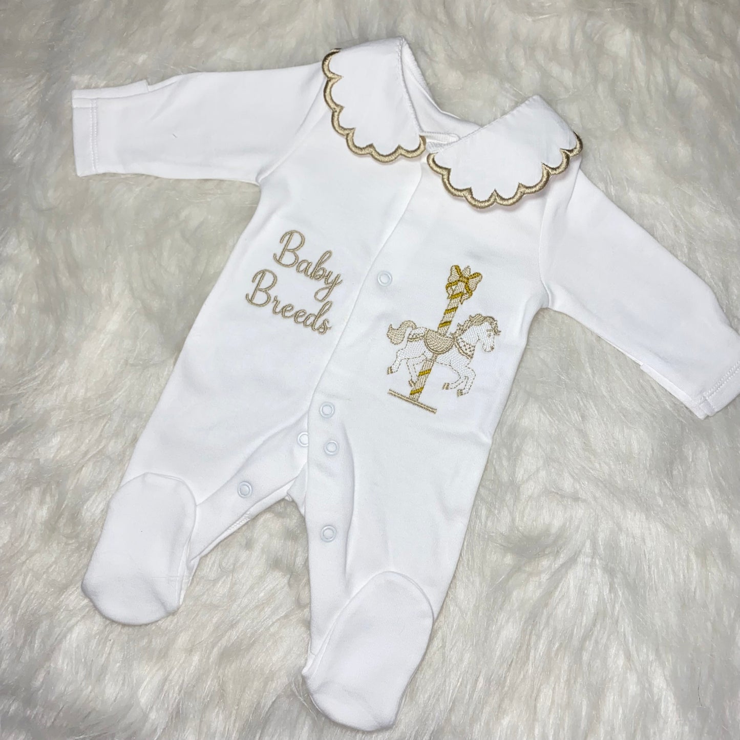 Unisex carousel horse babygrow