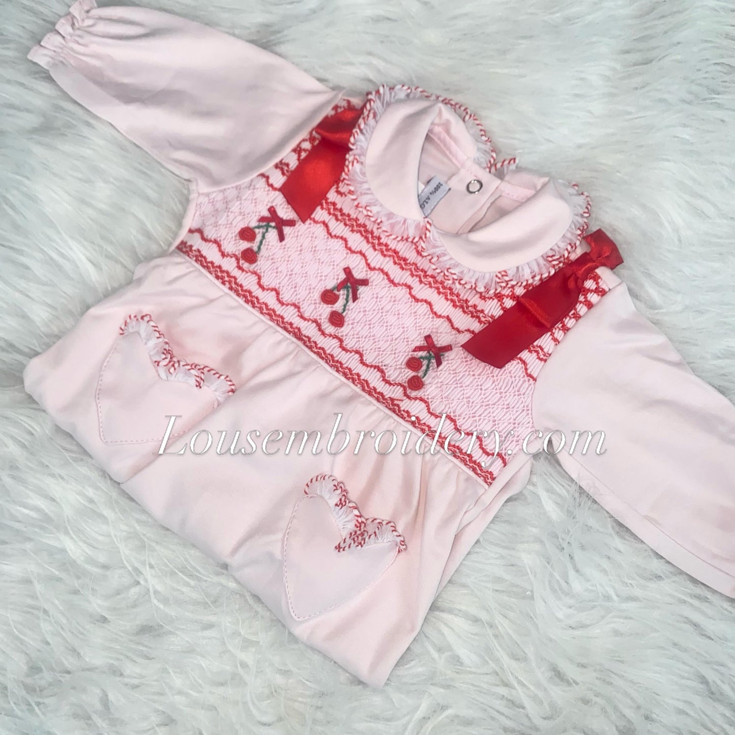 Cherry and bows luxury Pima cotton smocked babygrow small sizing