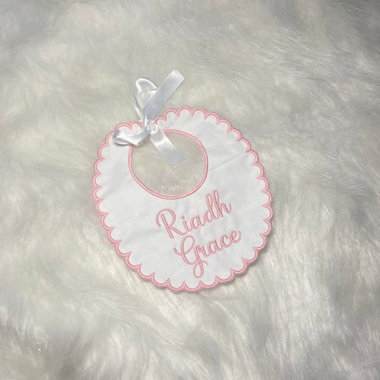 Hand made bibs with ribbon tie