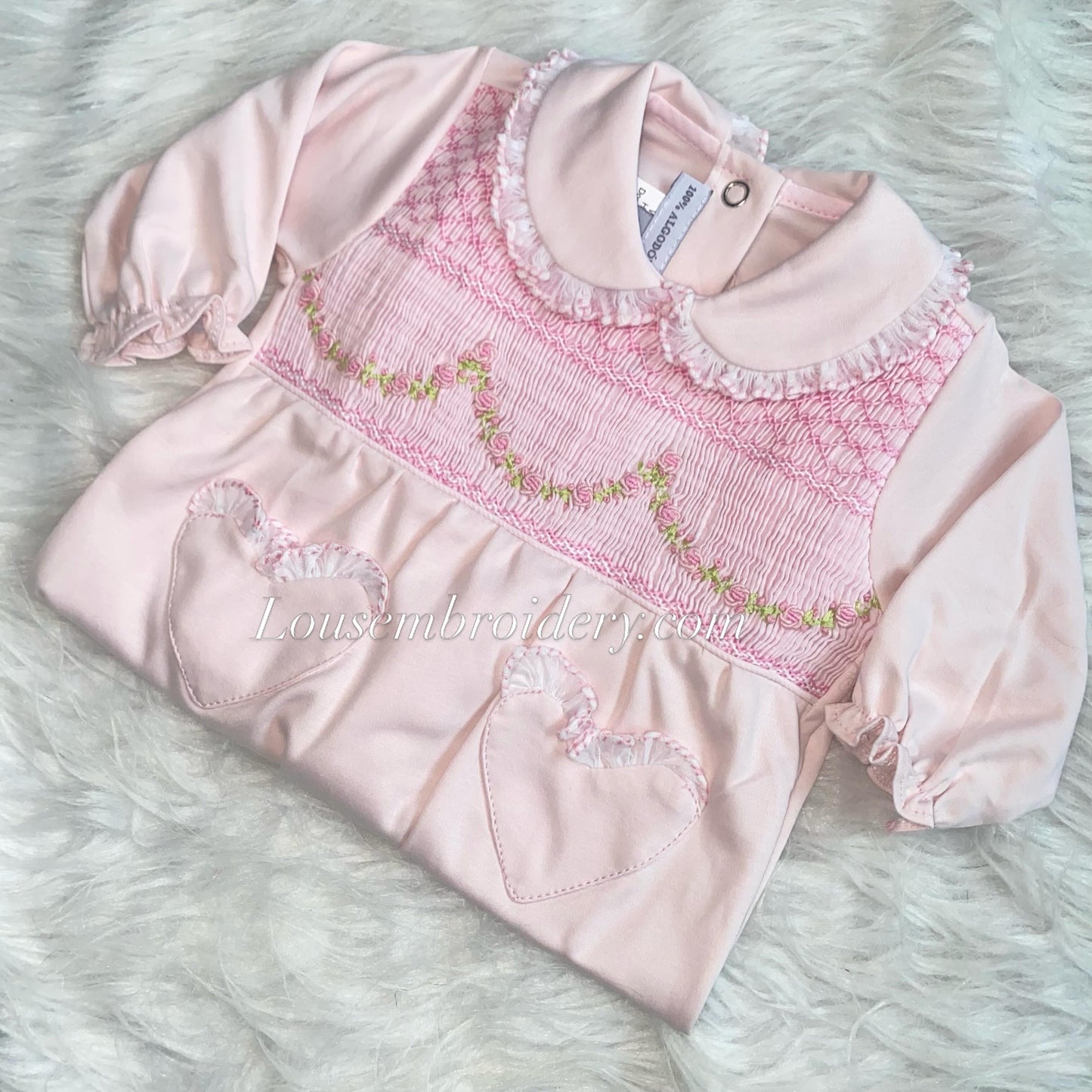 Pink garland luxury Pima cotton smocked babygrow small sizing